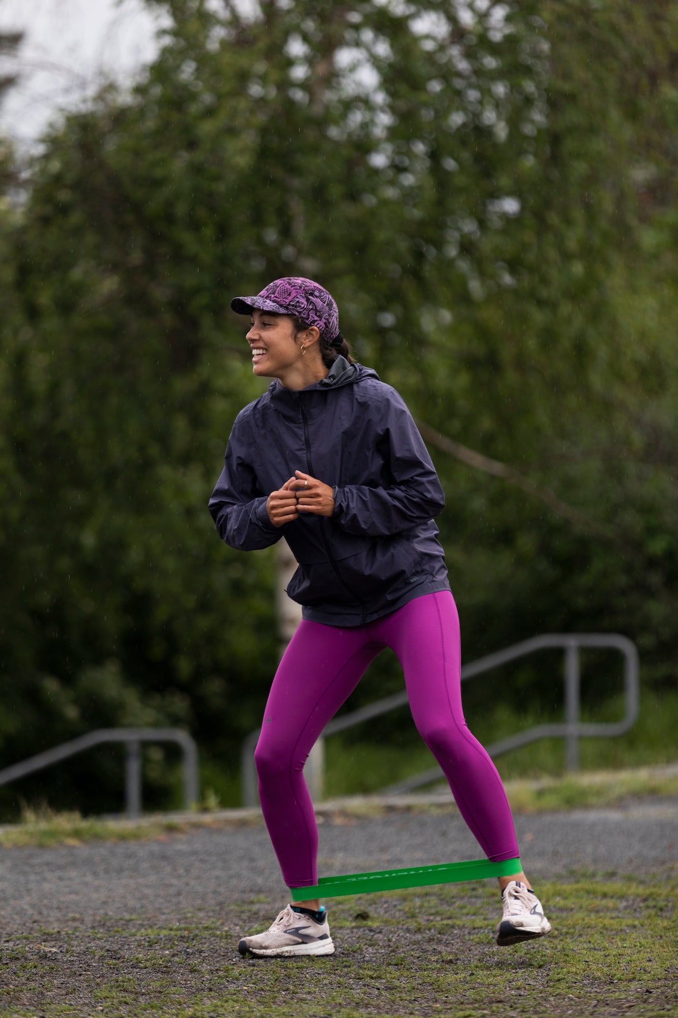 Justine does an exercise in the park