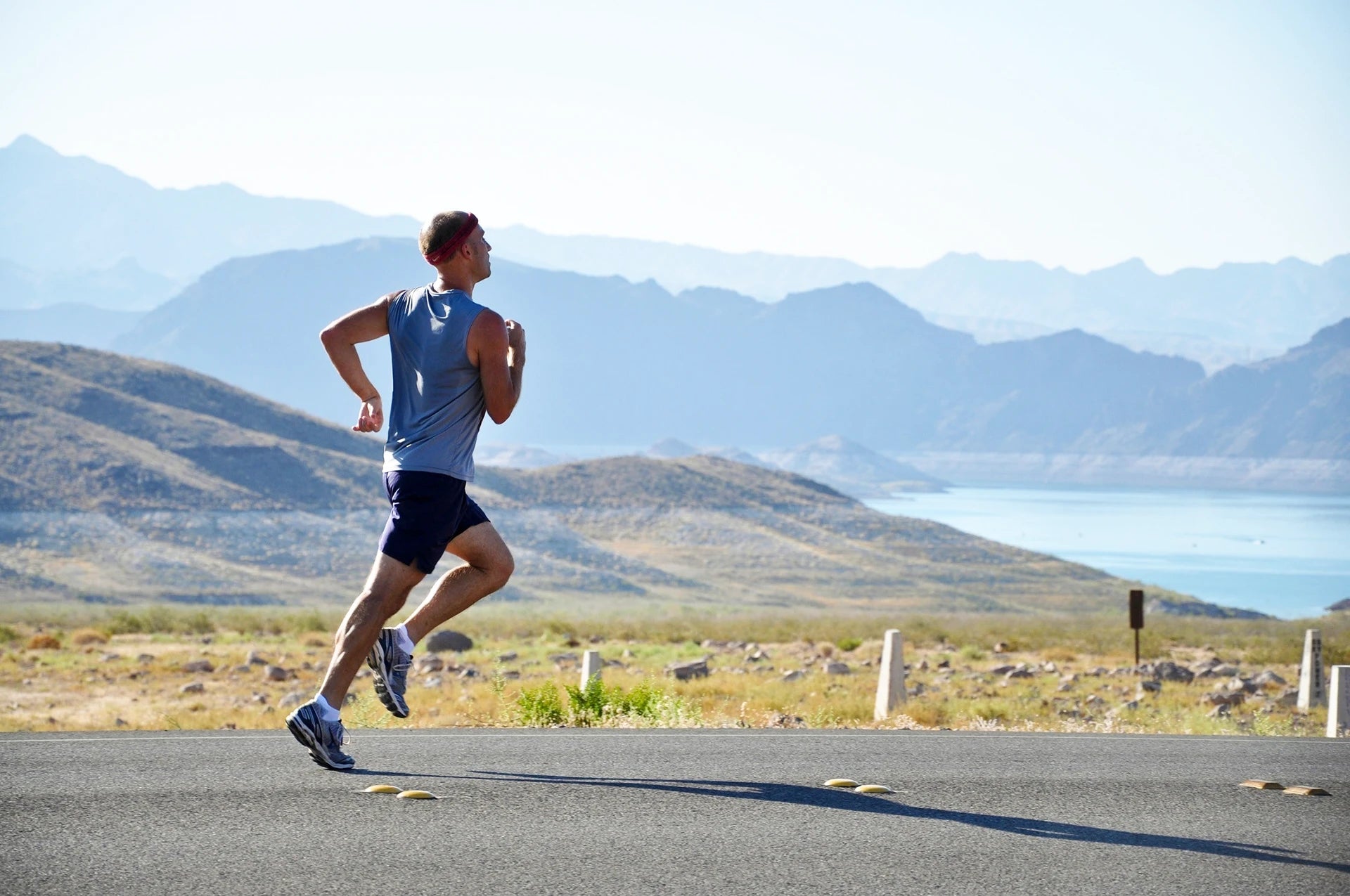 Guy running outdoors in the mountains