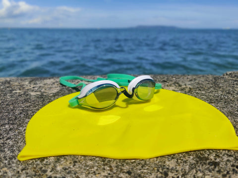 Bearhug | Sea Swimming must haves: Bright yellow neoprene swimming cap and swimming goggles