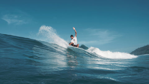 Santa Teresa surfing in twin fin surfboard made in montreal