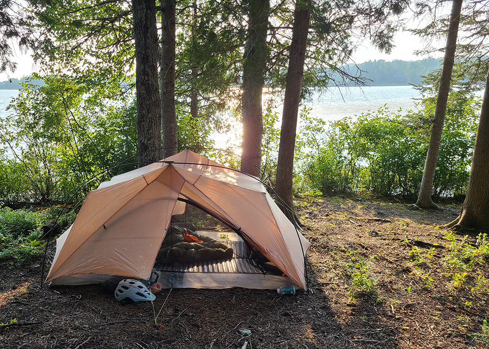 a zpacks tent in the morning sunshine - how to sleep better on trail