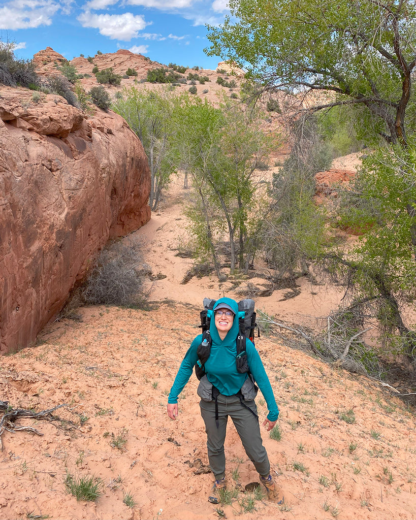 SWD co-founder Ashley wearing her backpacking