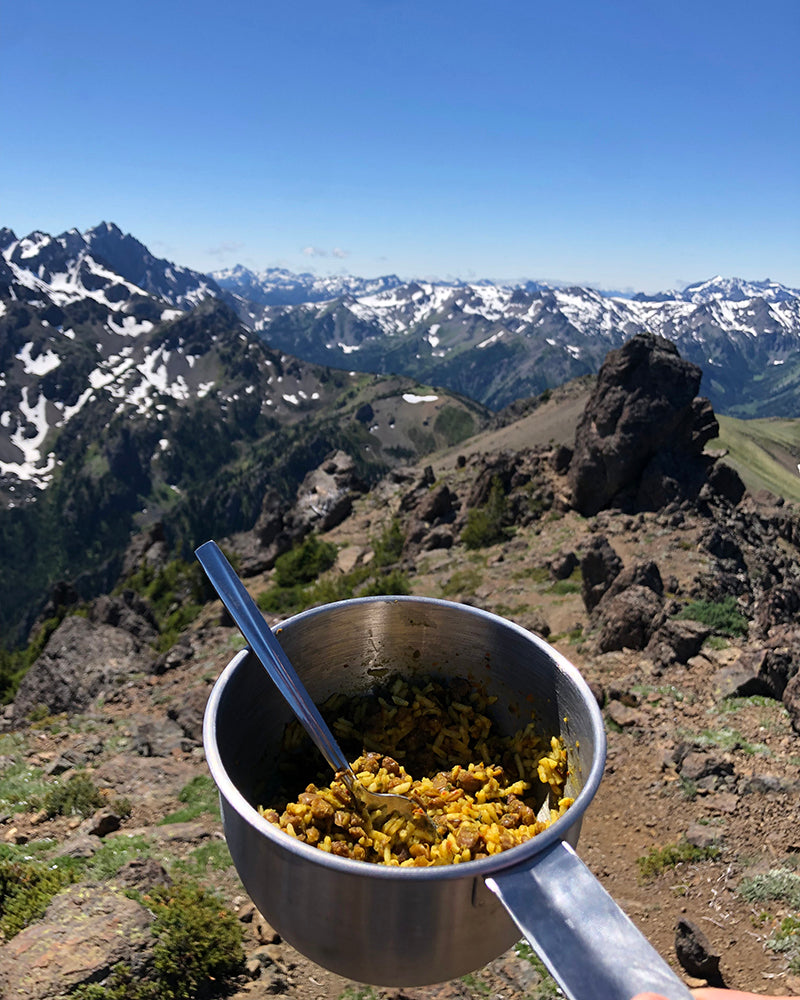 yumbini in a cooking pot in the mountains