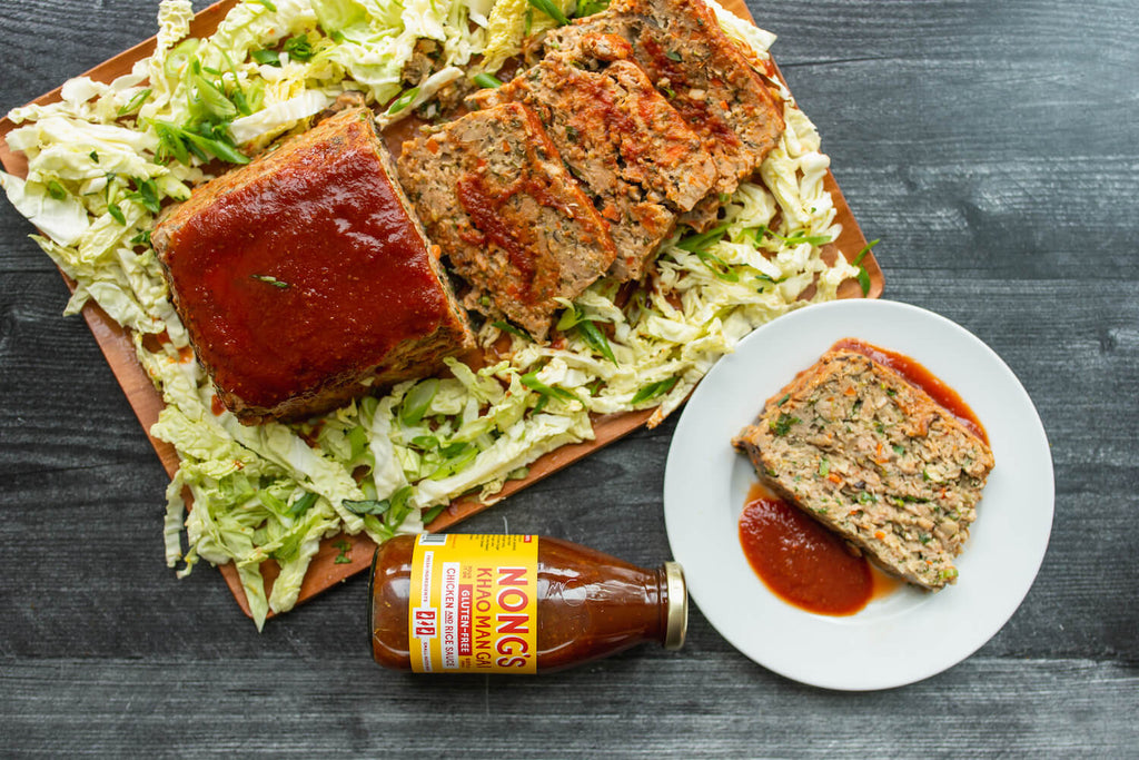 Turkey meatloaf cut and plated with glaze.