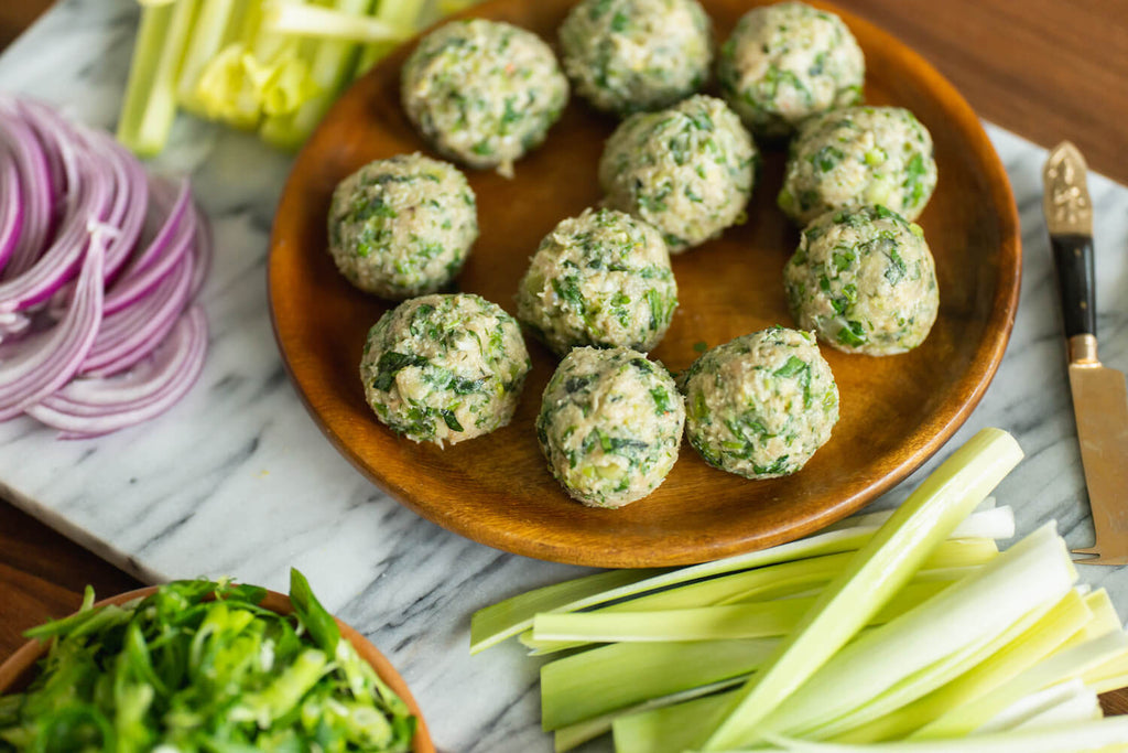 Raw meatballs before being cooked.