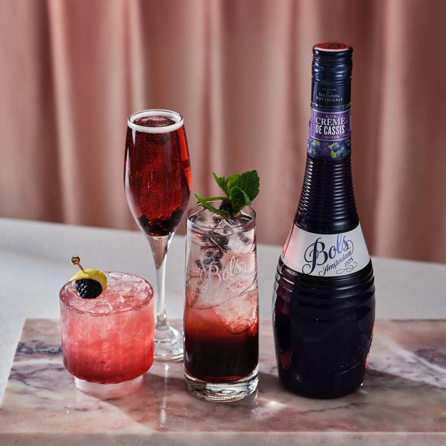 Bols Creme de Cassis liqueur with Kir Royale, Bramble, and Cassis Tonic