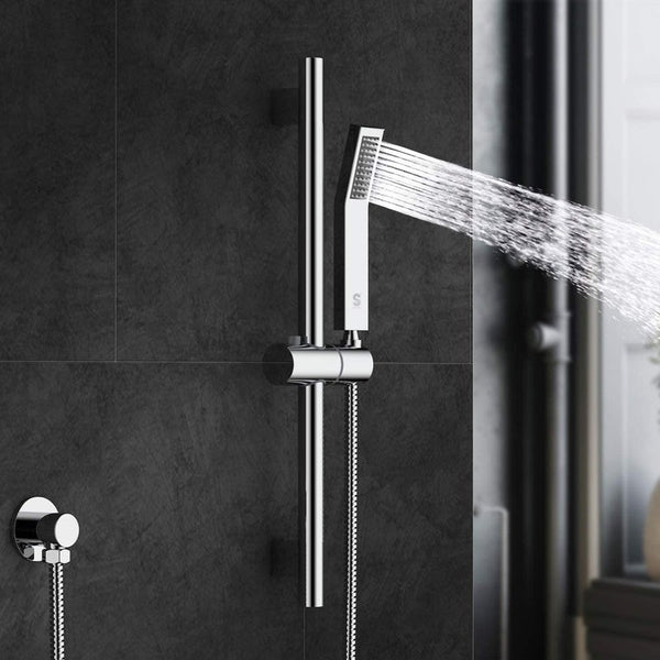 Polished chrome shower system comes with a slide bar on dark gray bathroom wall