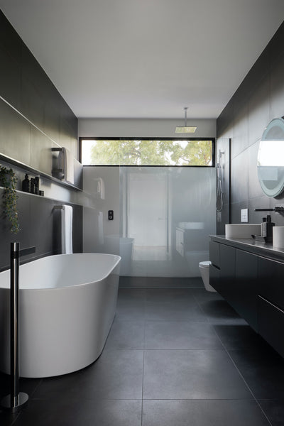 minimalist bathroom with white tub