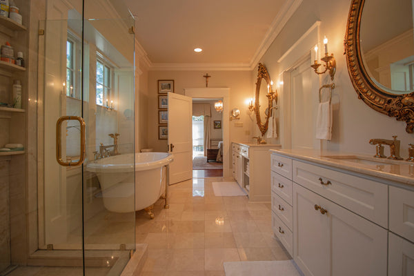 spacious white bathroom with ambient lighting