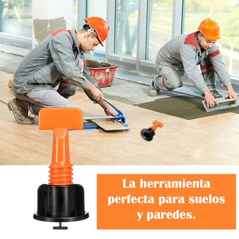 Reparador adulto en un uniforme especial que pone baldosas con sistema de  nivelación de baldosas en el suelo en un nuevo ho