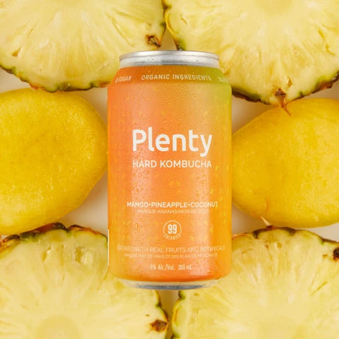 Mango + Pineapple + Coconut by Plenty Hard Kombucha. A handcrafted alcoholic beverage naturally brewed to 5% alcohol content with refreshing tropical flavours