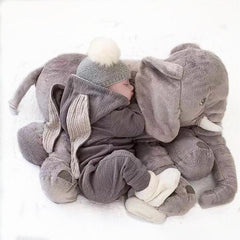 2 Months baby sleeps on a comfy elephant pillow