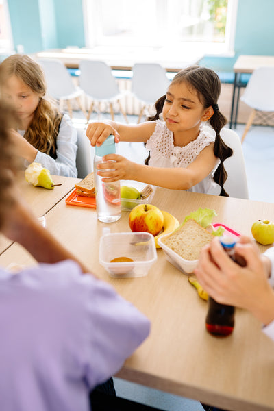 Encourage school waste reduction at school by promoting the use of reusable water bottles, lunch containers, and utensils