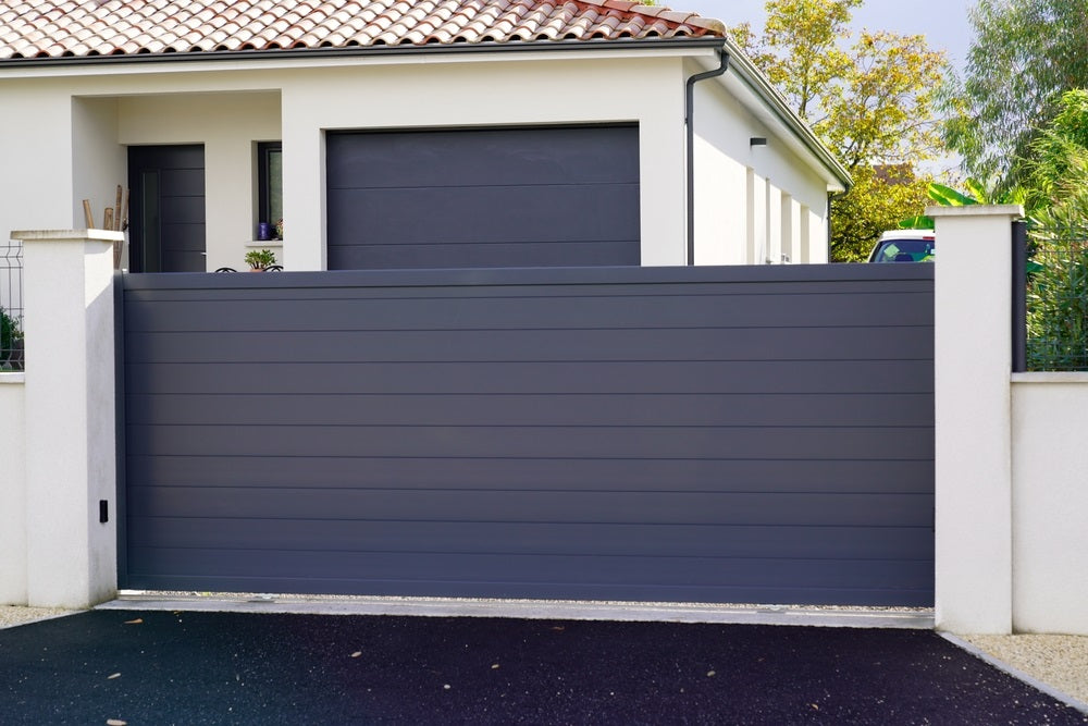 dark gray aluminum gate portal of suburb house door entry