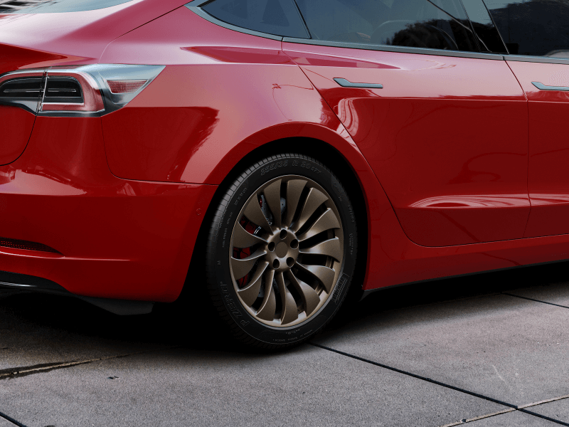 19″ ENTERPRISE Fully-Forged Wheel for Tesla Model 3 - Borealis Bronze custom aftermarket wheel on a red Tesla Model 3