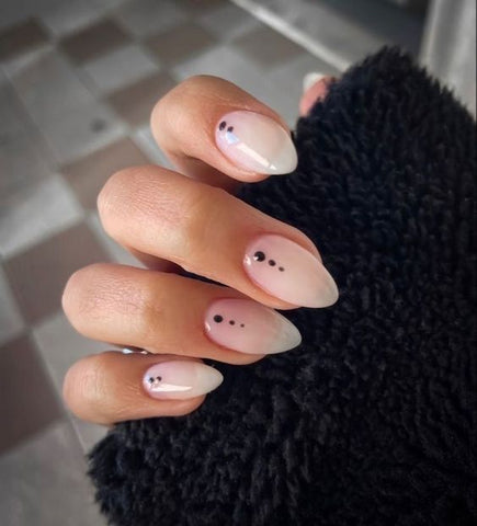 Minimalist Nail Design Milky nails and black dots nail idea