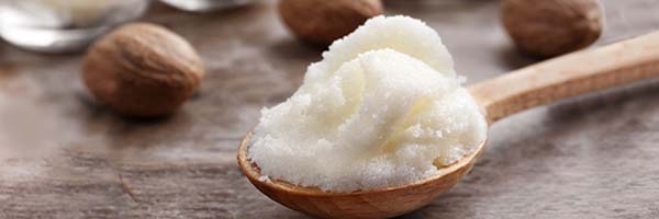 Shea Butter on wooden spoon