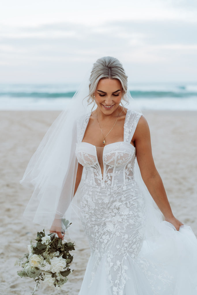 Bride wearing lace and tulle wedding dress