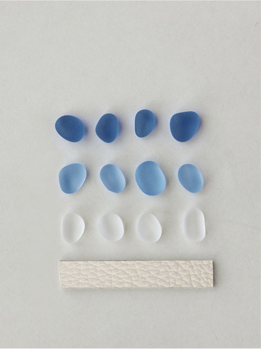 Ocean-inspired glass beads in graduated shades of blue and frosted white