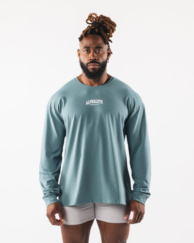 Alphalete activewear learn more dream more green logo long sleeve large -  $30 - From Nolan