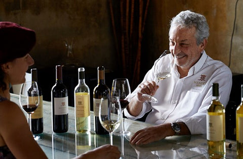 Roberto De La Mota tasting wines