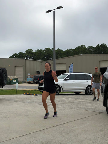 SoWal CrossFit® athlete completing a run outside on the road