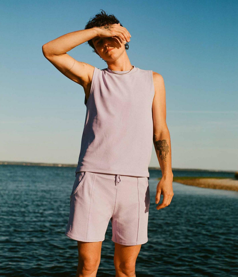 Transmasc model in lilac Romeo swimtank and Elliot swimtrunks