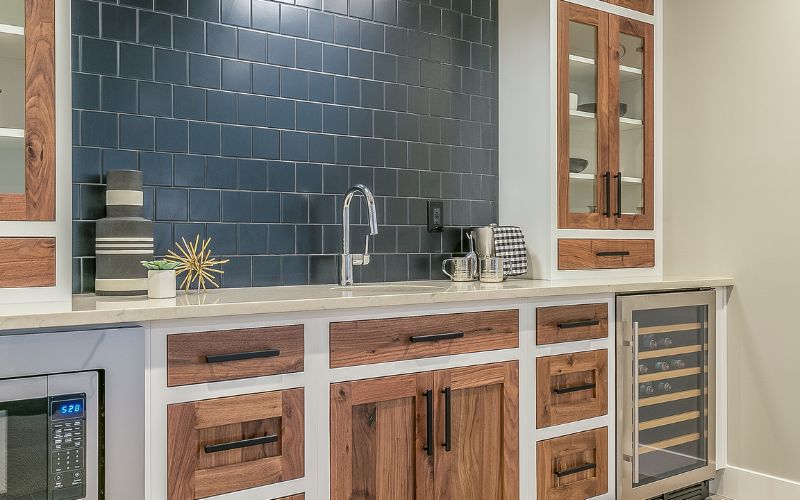 Beautiful kitchenette with blue tile backsplash