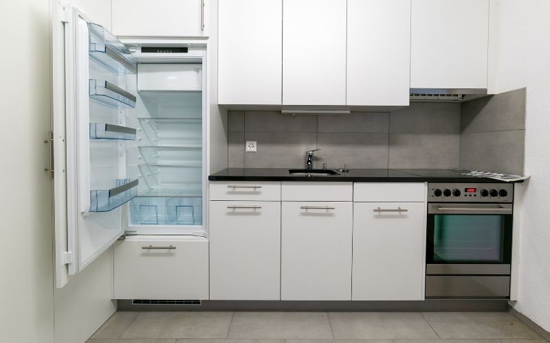 Interior View of Simple and Modern Kitchen in Gray and White 