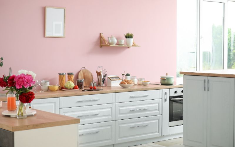 Interior of a Stylish Modern Kitchen in Flamingo Pink