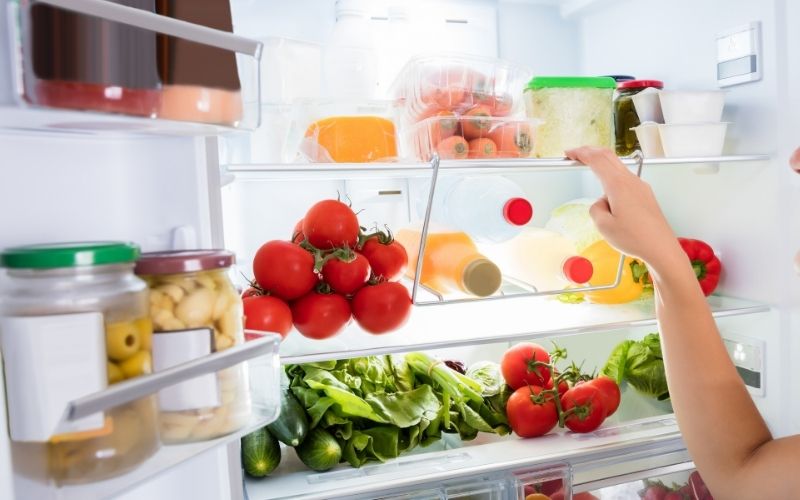 Separated veggies from fruits in a fridge