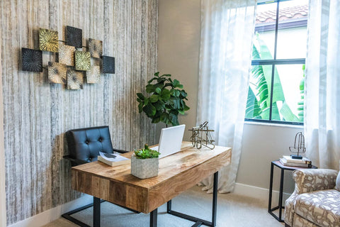 A leather chair and a wooden desk in a room