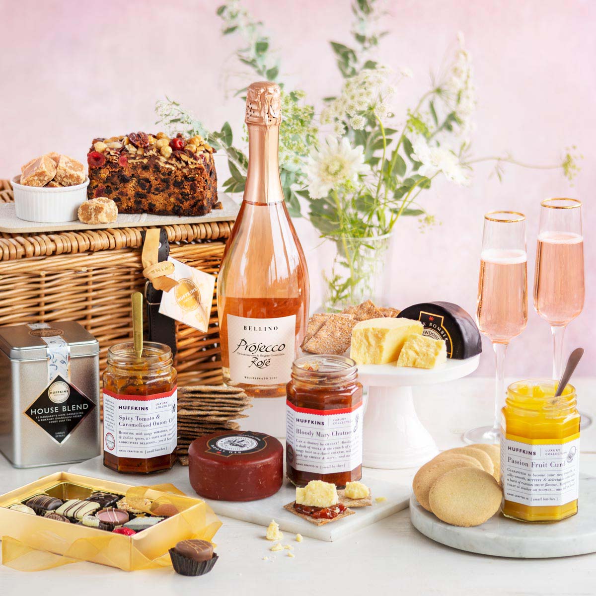Huffkins cheese and Prosecco hamper filled with sweet and savoury goodies