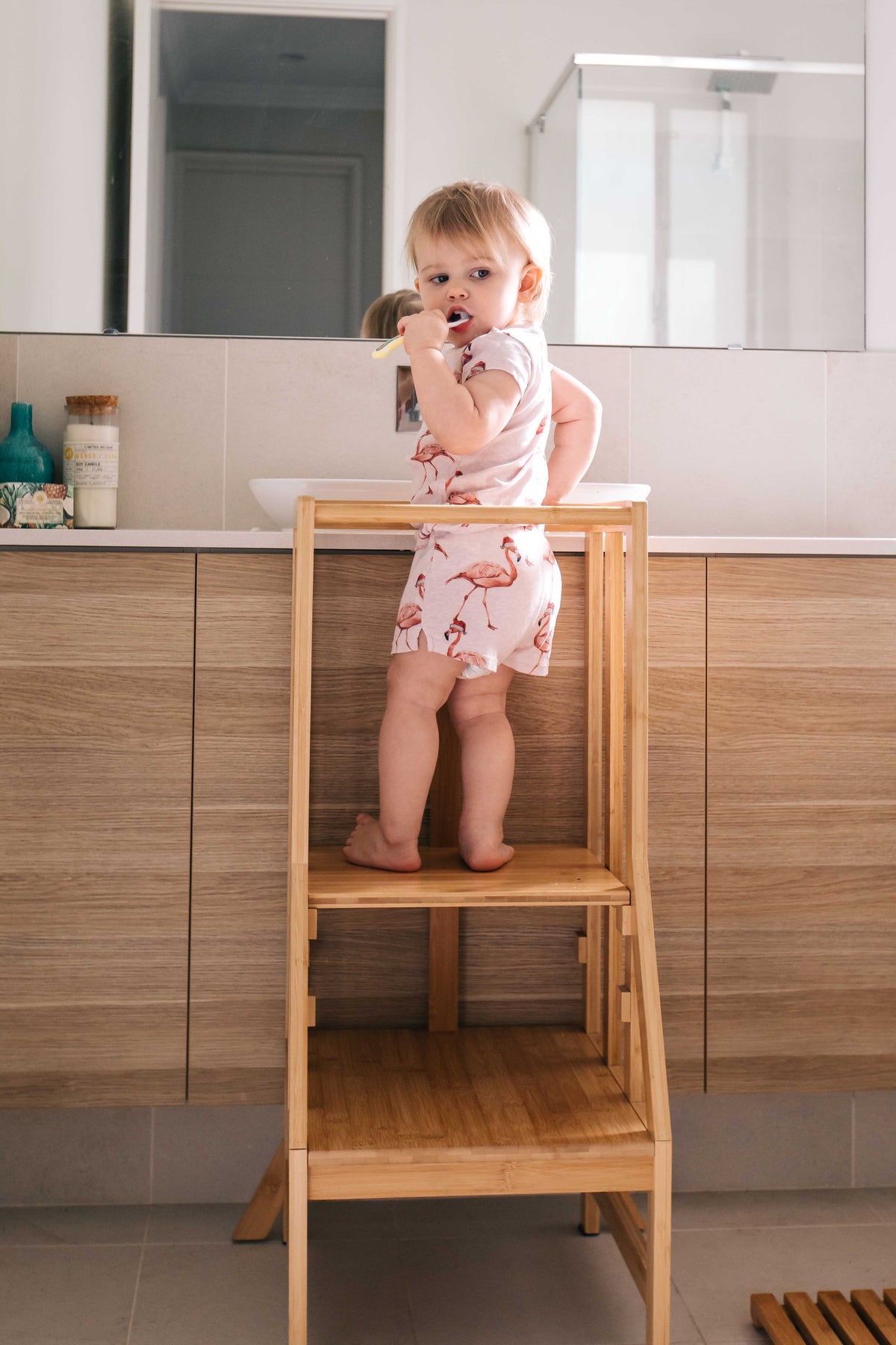 Bamboo Helper and little boy at the bathroom bench