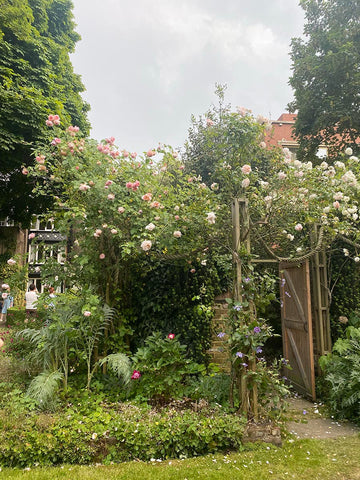 Inside the garden of Kelmscott House, home to William Morris textile artist