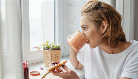 Girl Drinking Coffee with no cell phone