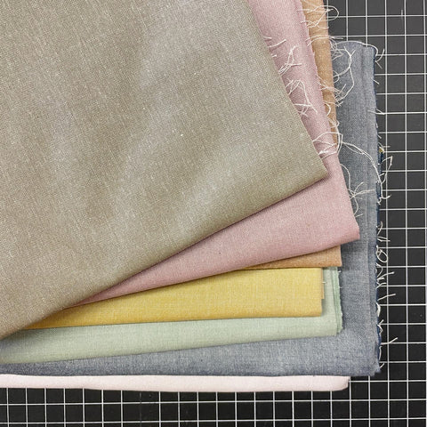 stack of pastel fabric