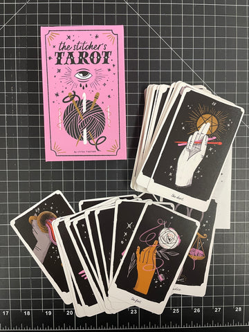 stitcher's tarot deck, showing the box and a spread of the cards