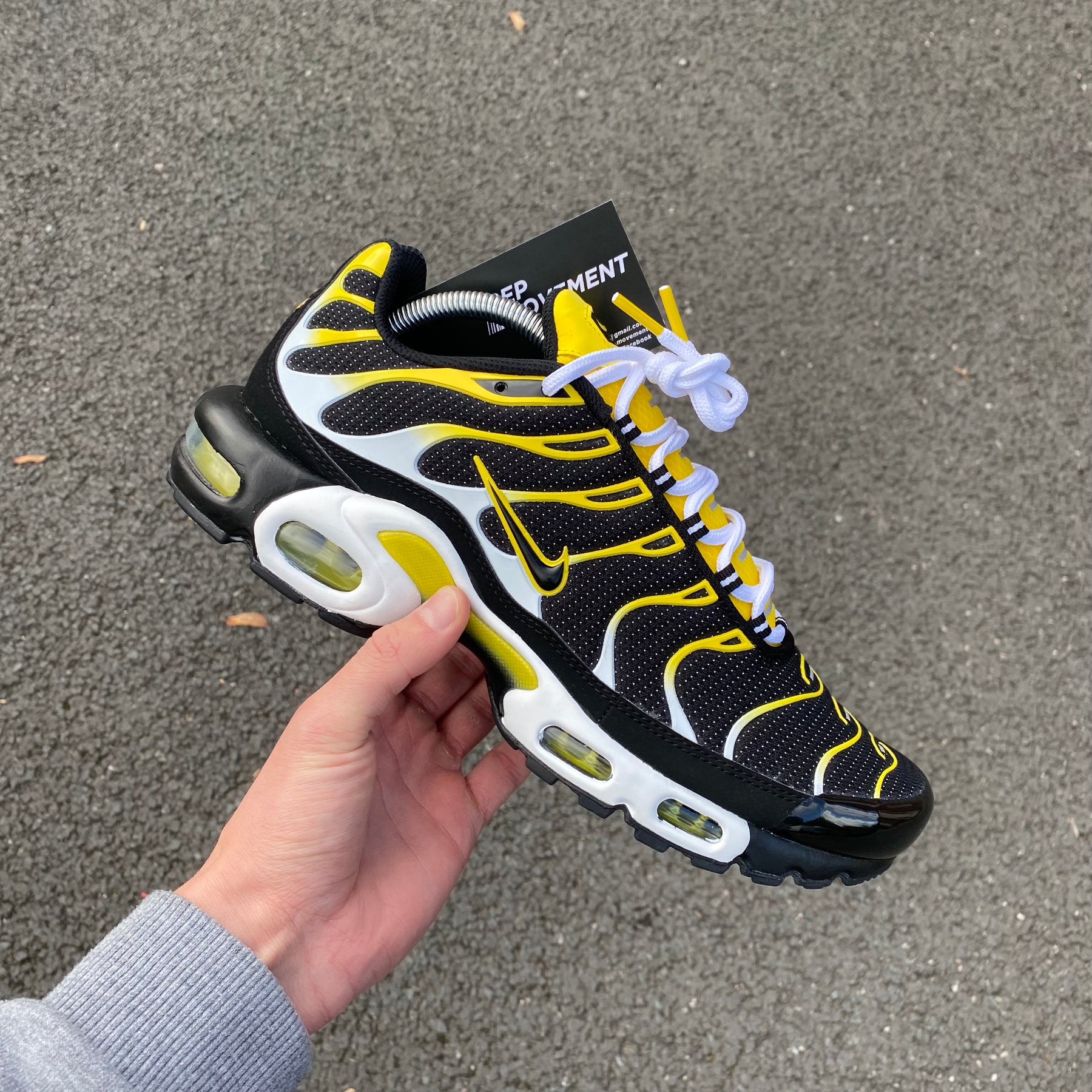 yellow and black nike tns