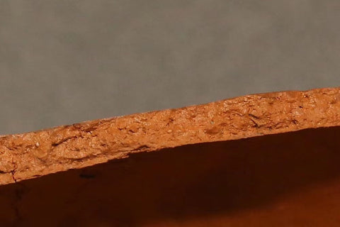 a broken piece of zhuni clay