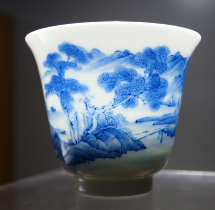 Jingdezhen porcelain with qinghua teacup glowing.