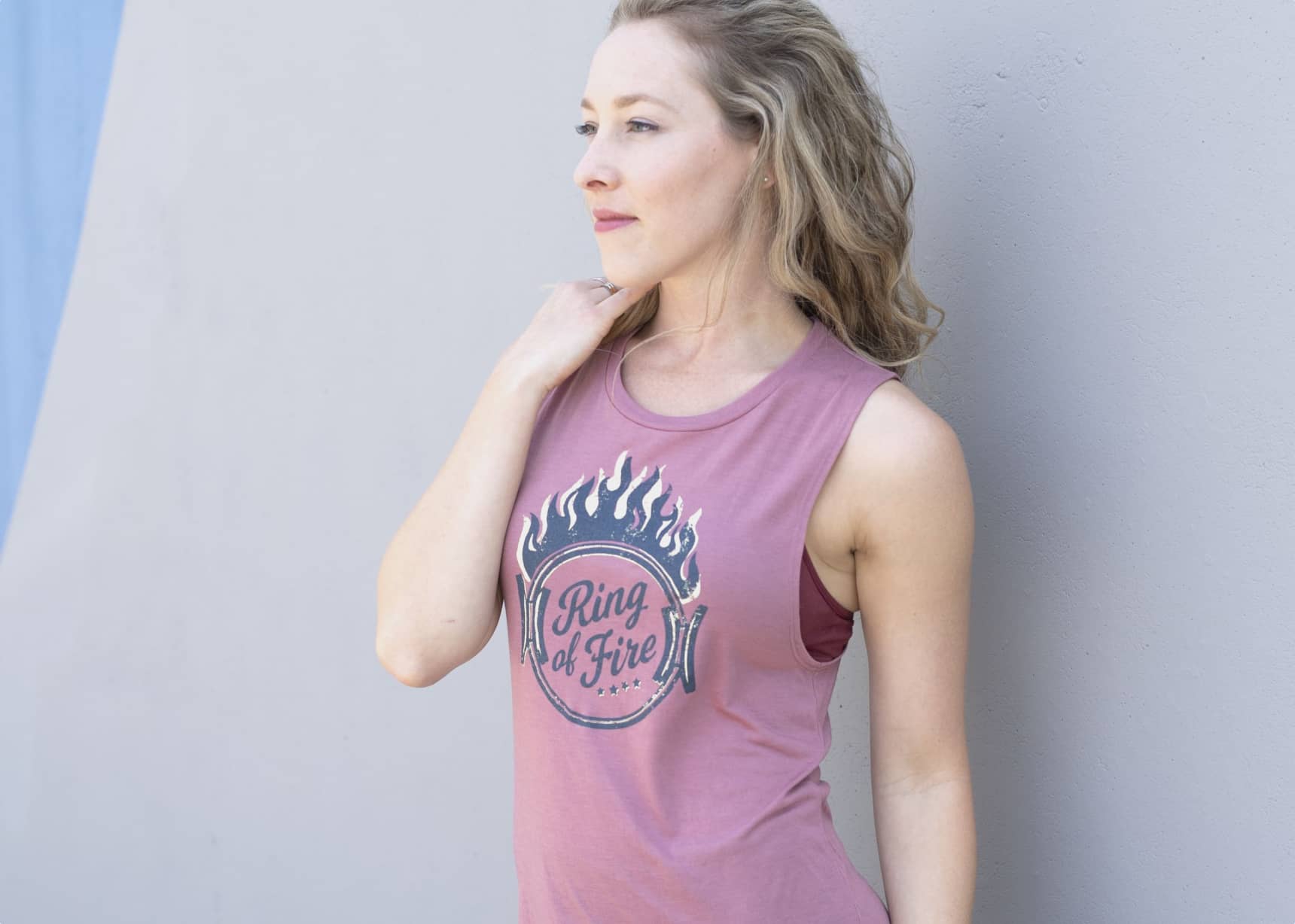 A more feminine version of the traditional muscle tee!