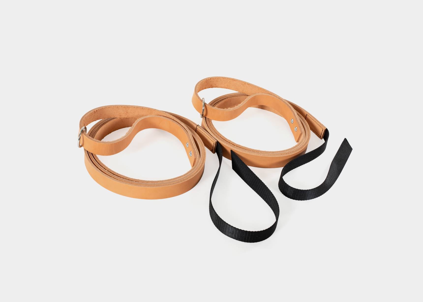 Oak tanned leather Reformer straps for secure grip.