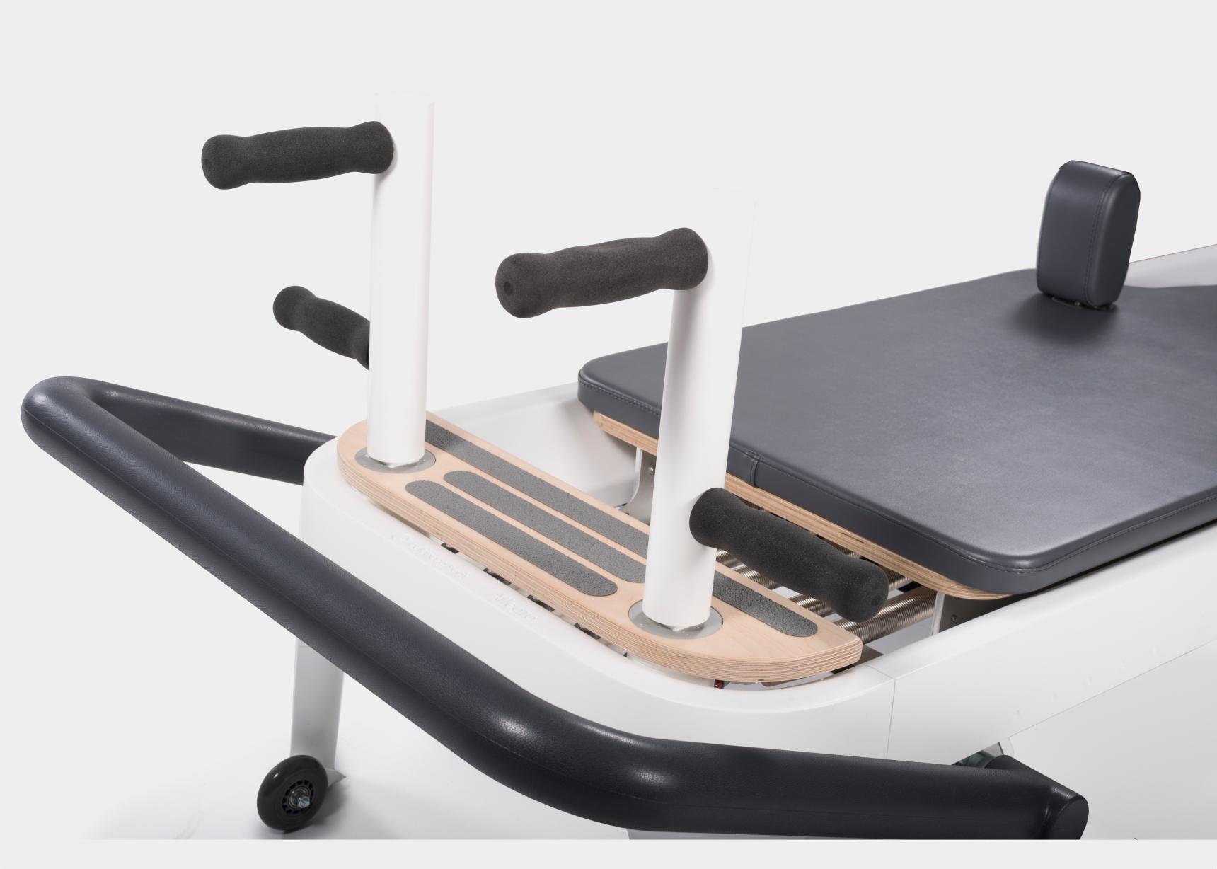 Allegro 2 Reformer plank bars for added workout versatility. 