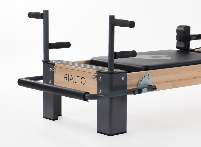 Rialto Reformer Plank Bar for advanced exercises.