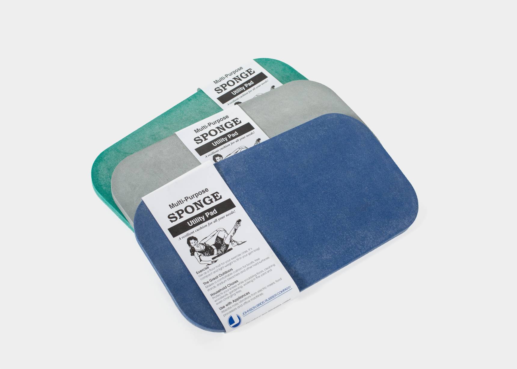 Multi-purpose non-skid utility pads in aqua green, light gray, and blue.