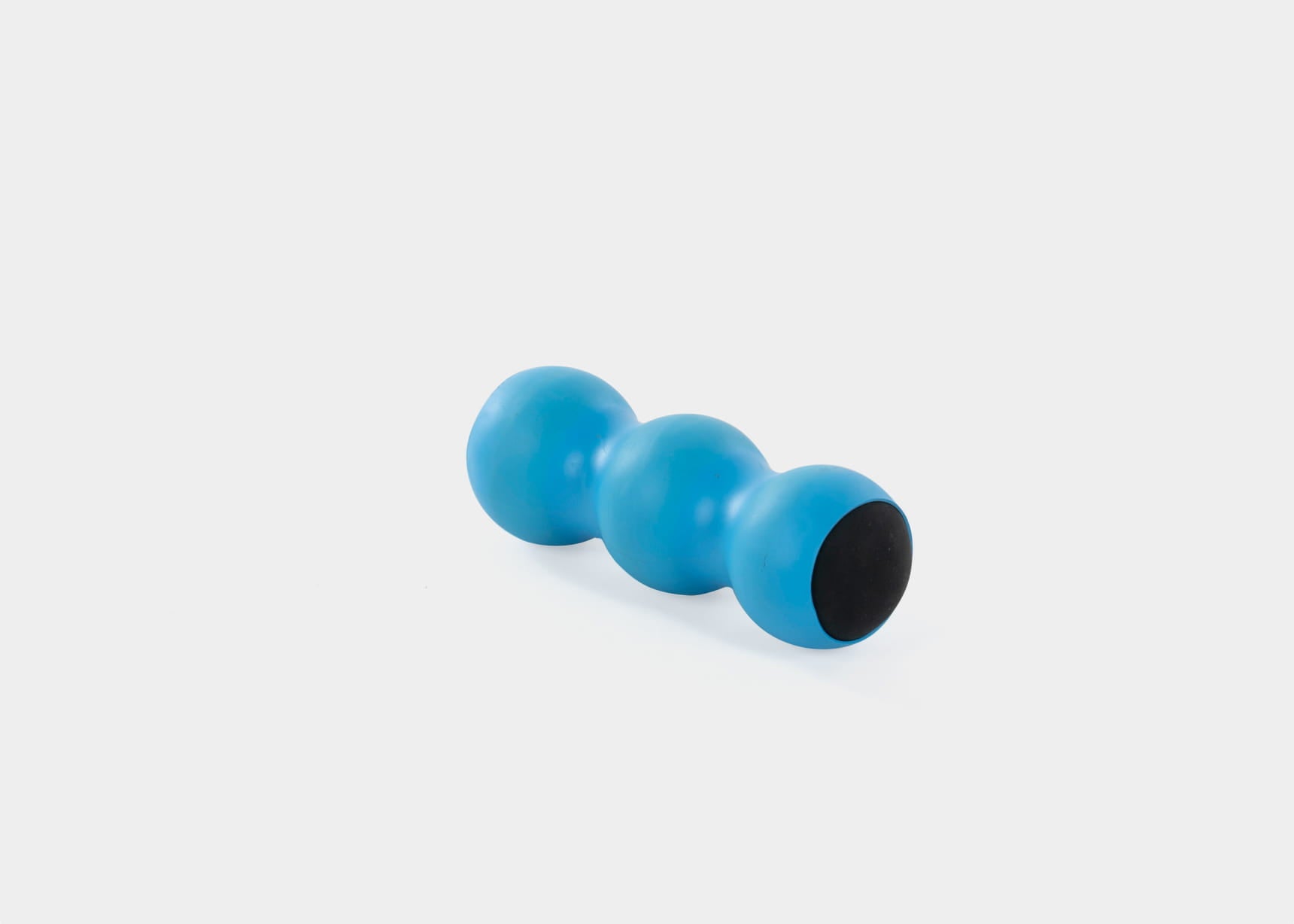 Blue KnotOut massage tool for muscle relief.