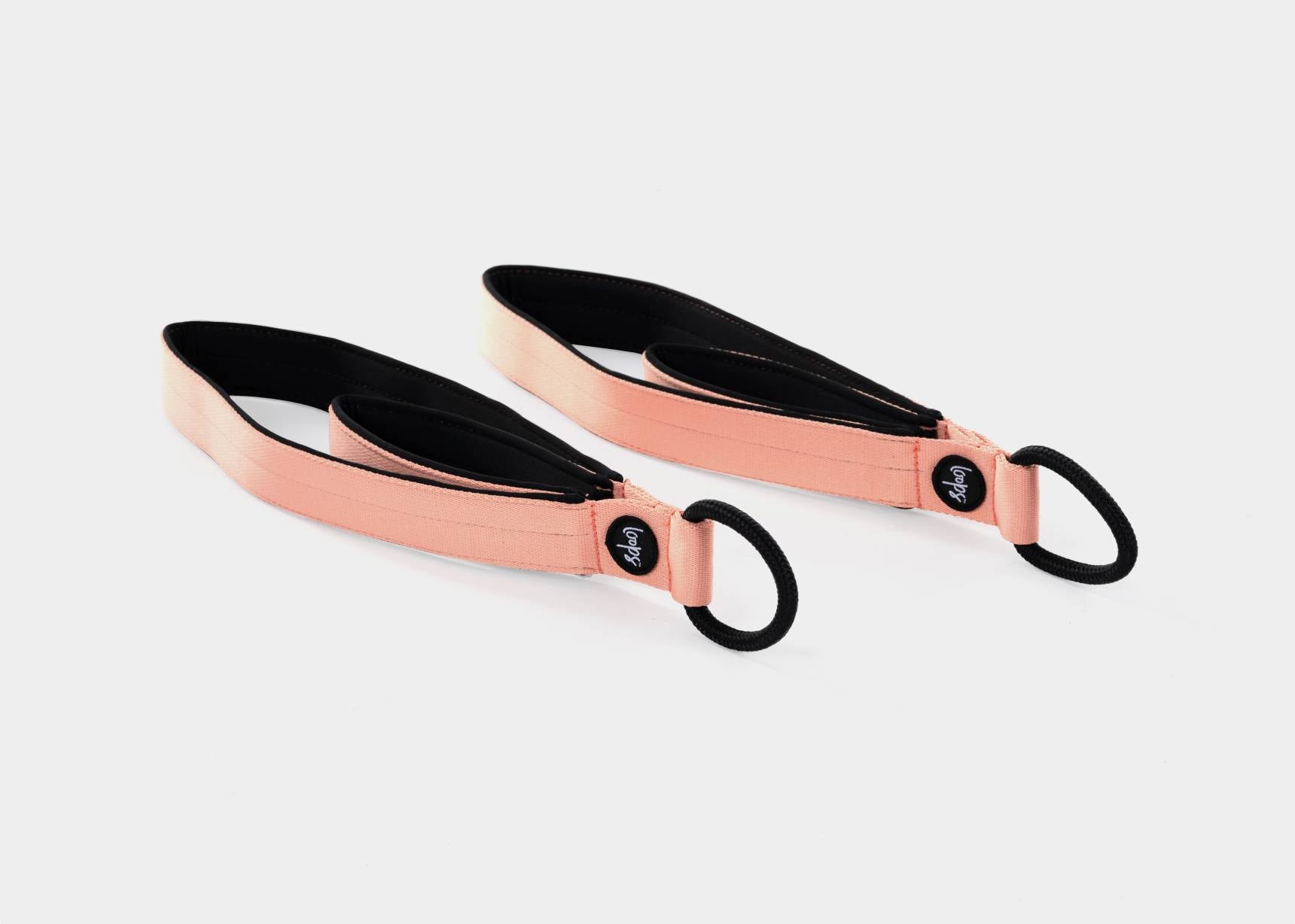 Coral-colored padded premium loops for reformer.