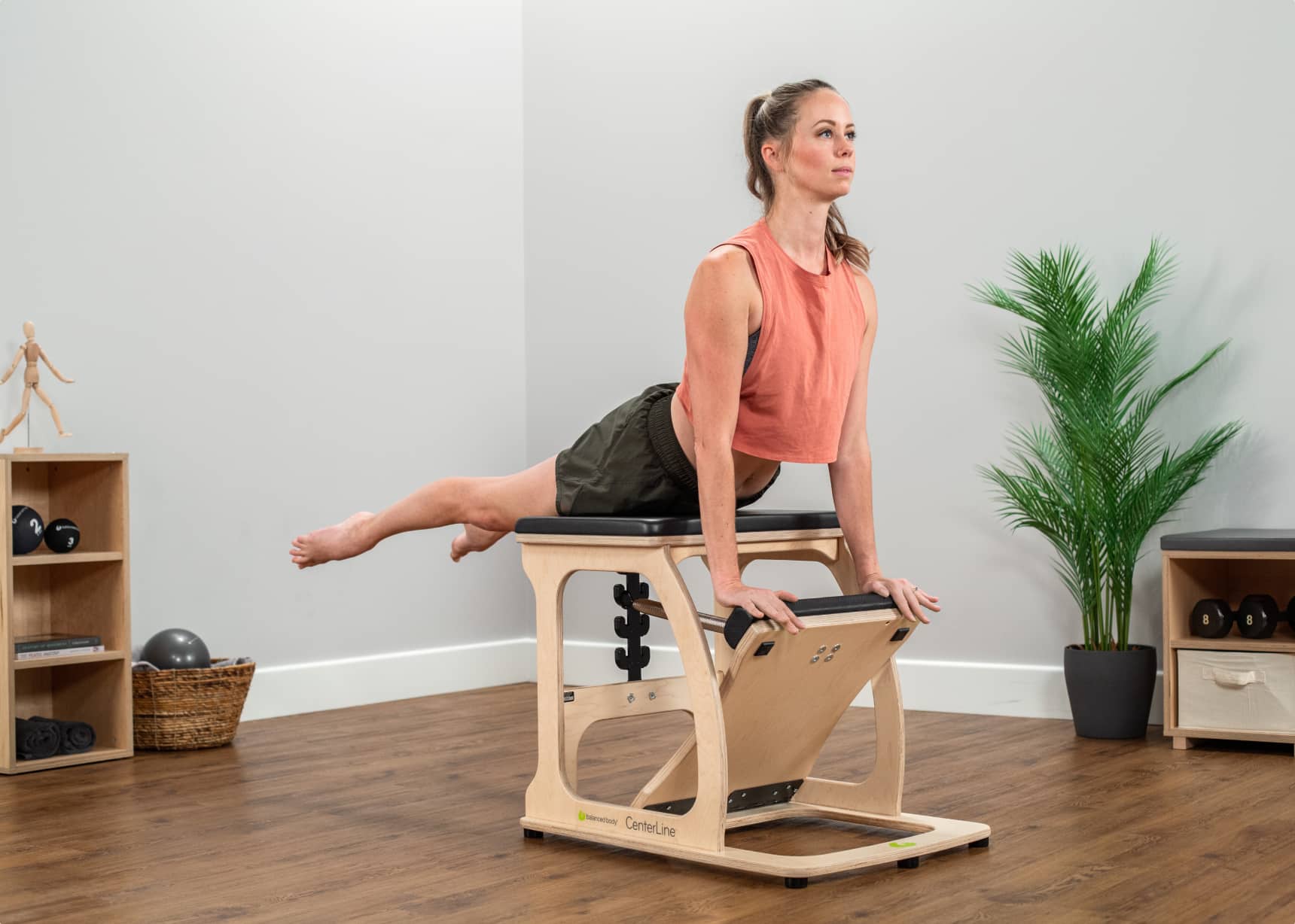 Student working out on CenterLine Chair