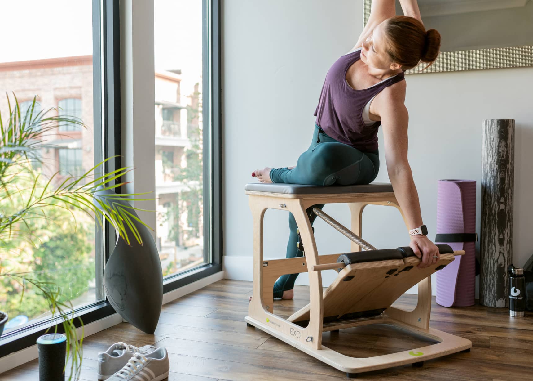 Student working out on EXO Chair